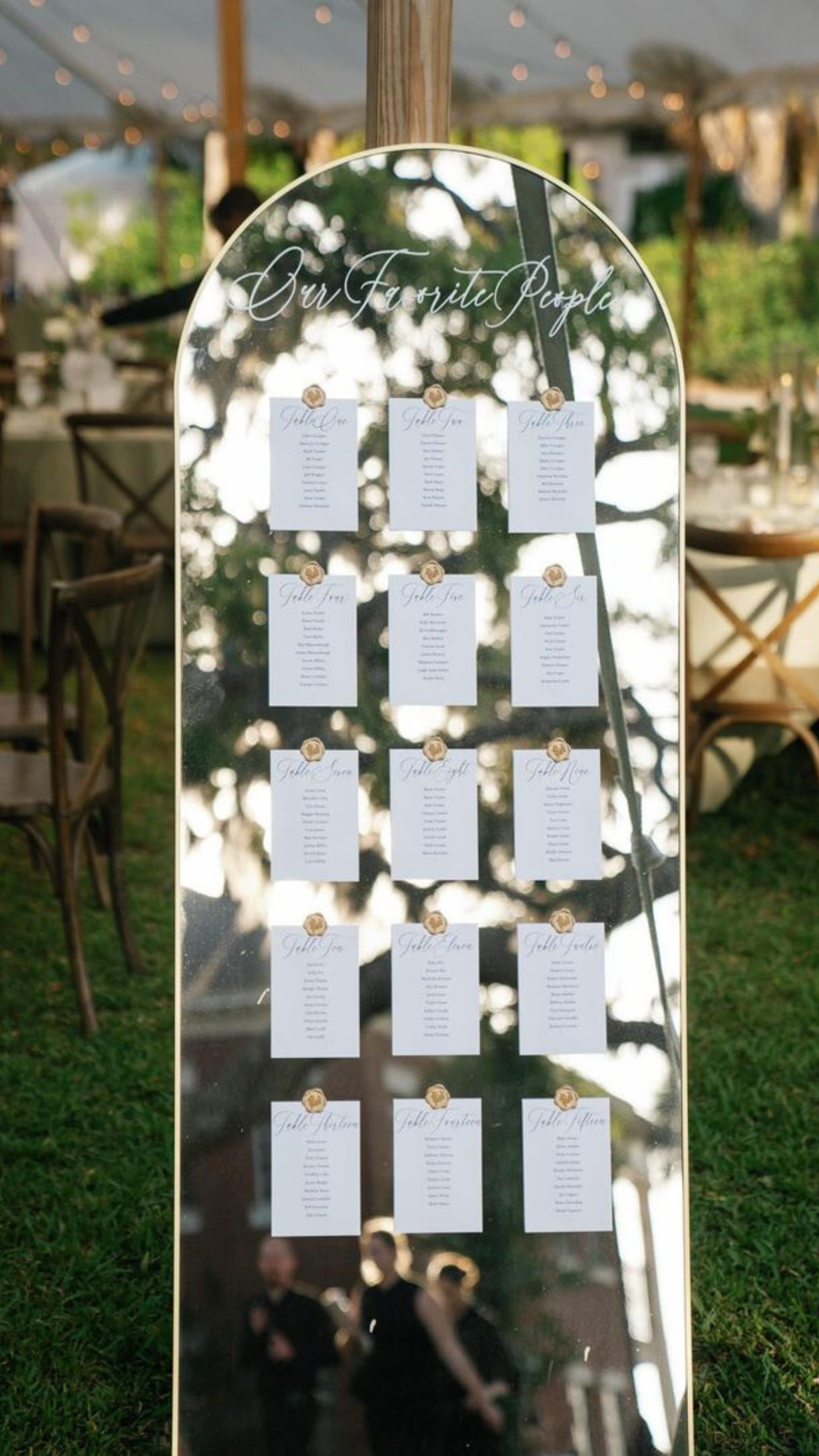 Wedding Table Seating Chart on Large Gold Arch Mirror