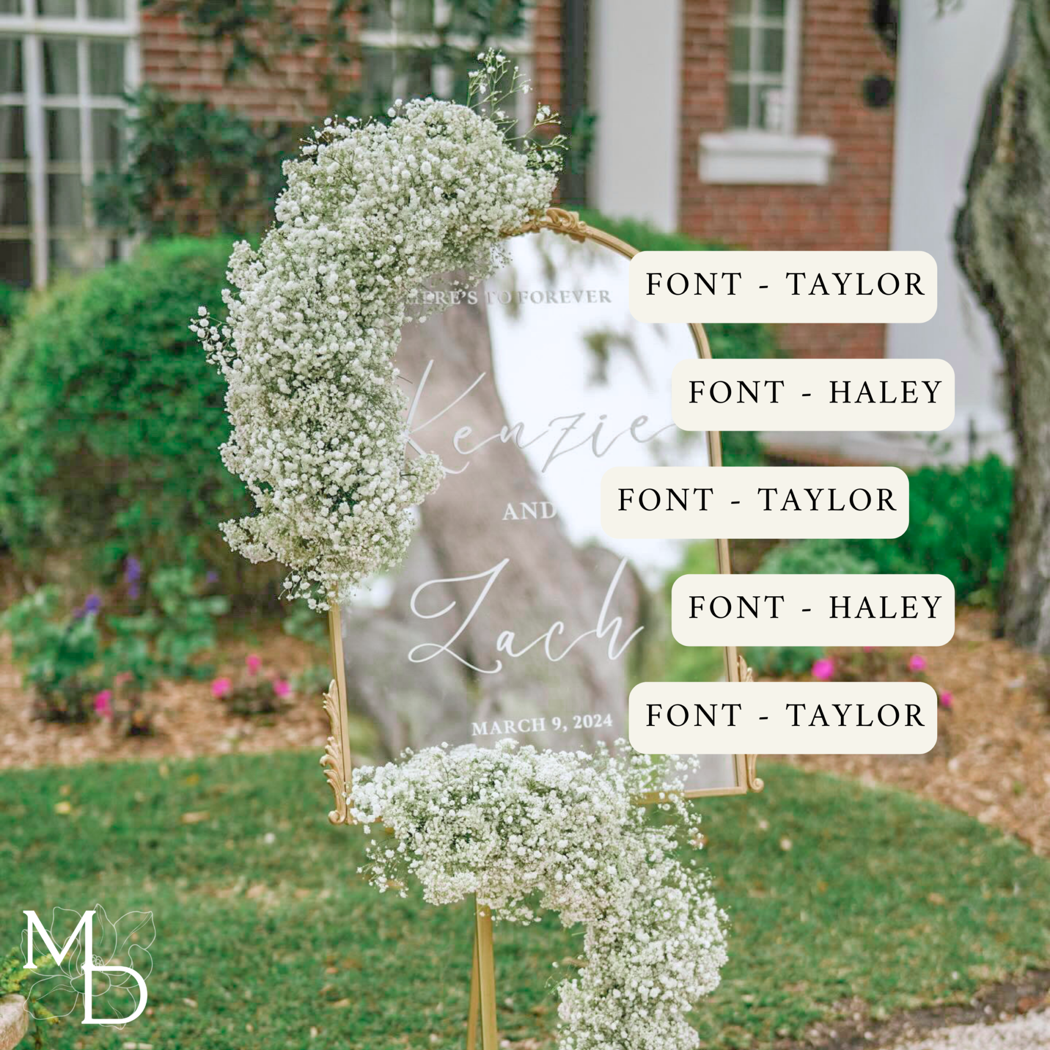 Elegant gold arch mirror wedding welcome sign with floral decoration.