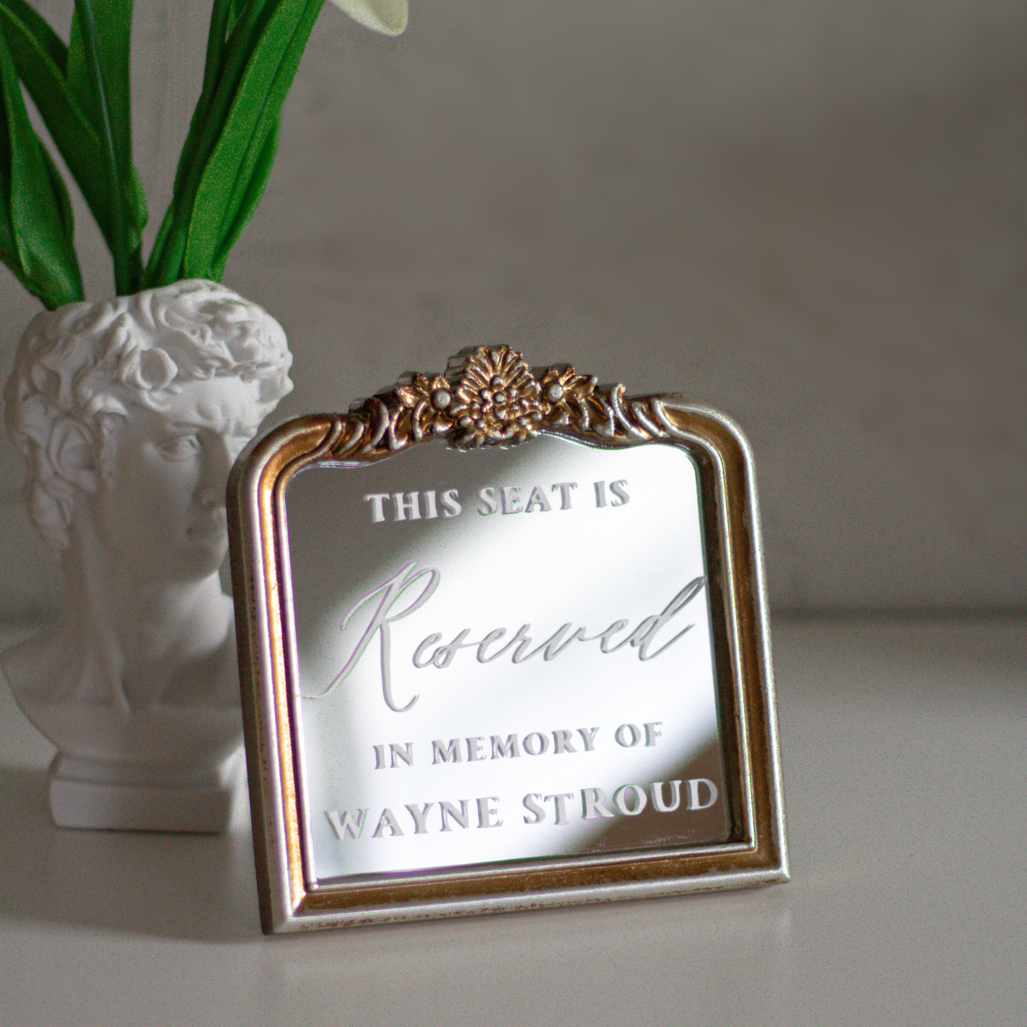 In loving memory wedding sign with customizable reserved seat display.
