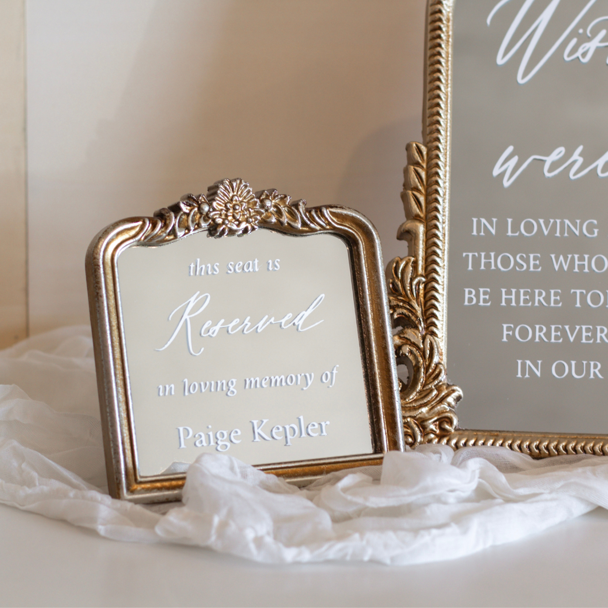 Wedding memorial sign on memory table with sentimental message.