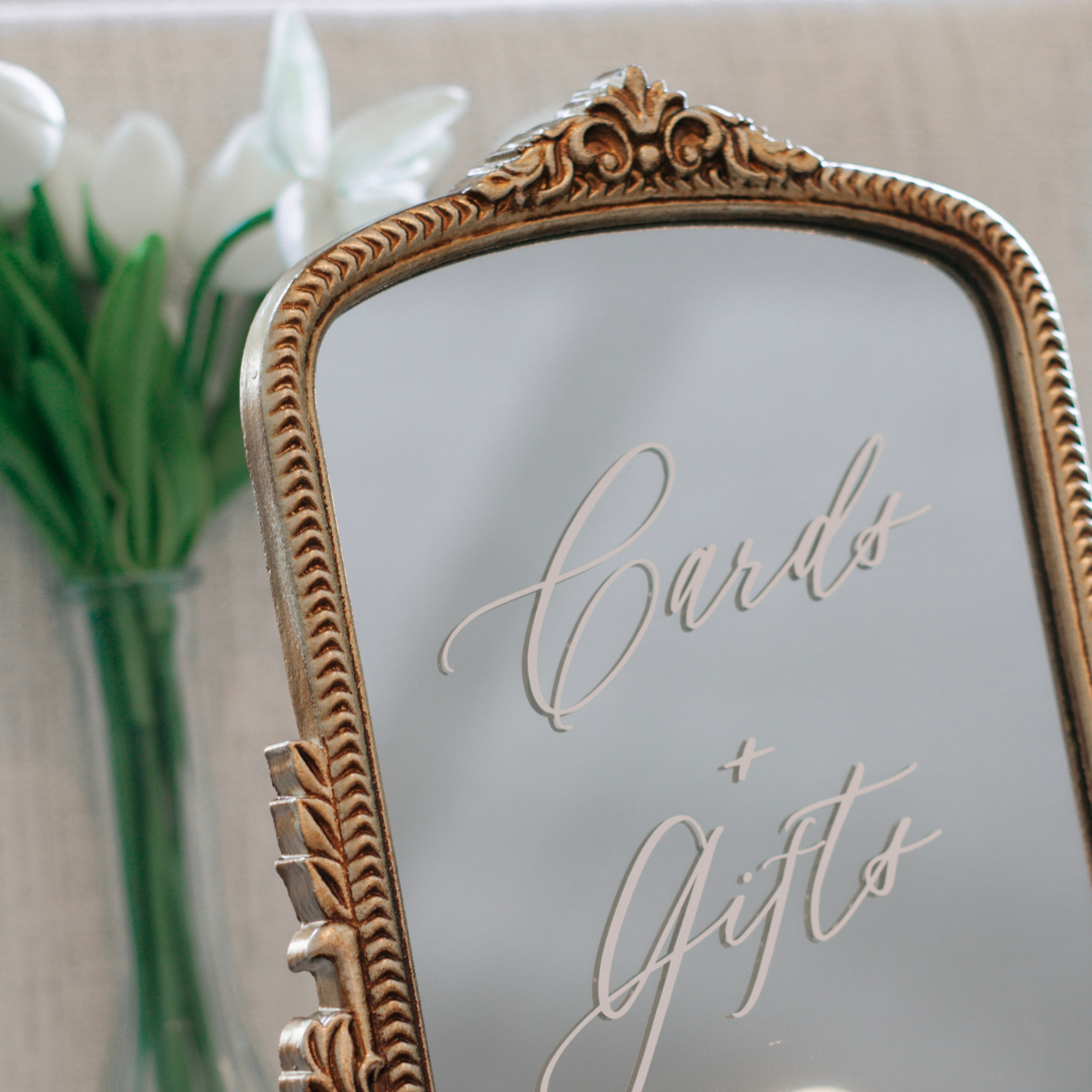 Elegant mirror wedding sign for gifts and cards table with ornate frame.