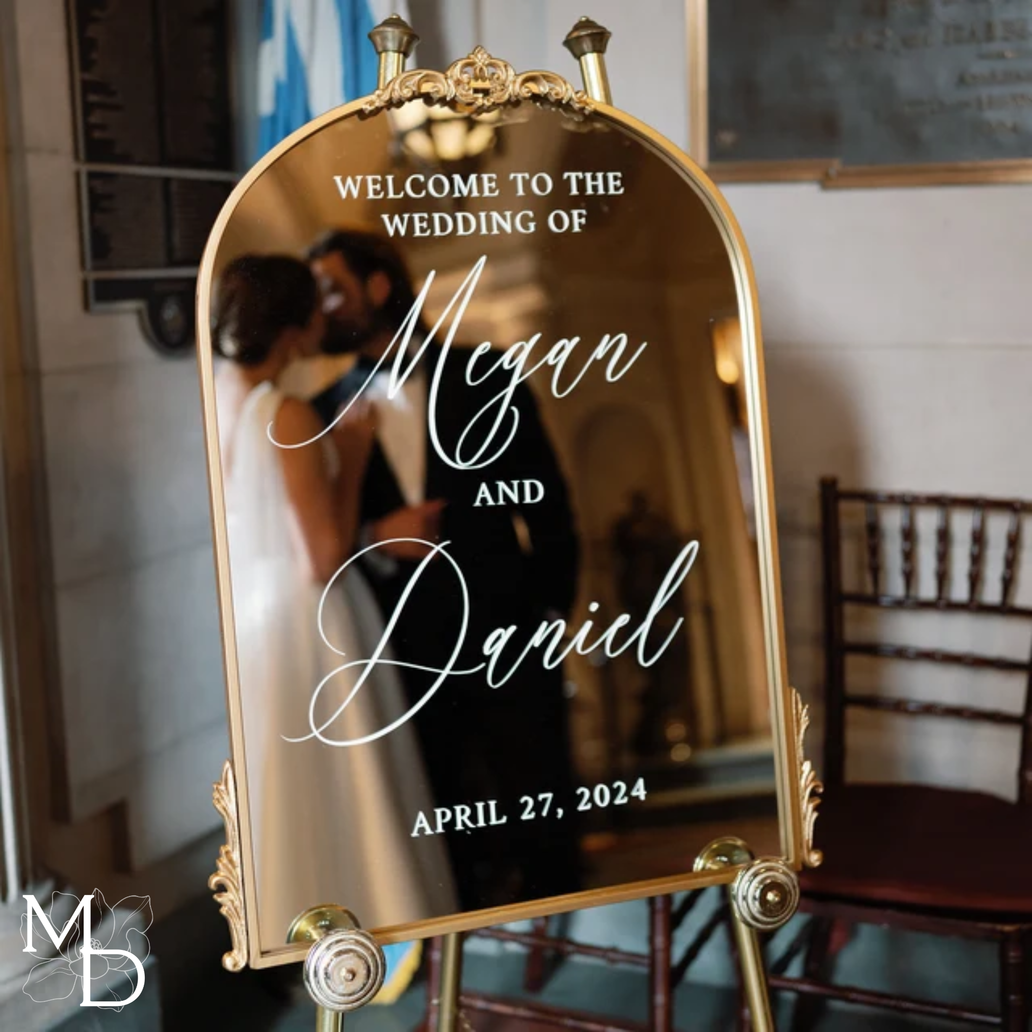 Antiqued gold wedding welcome mirror with custom scripted calligraphy.