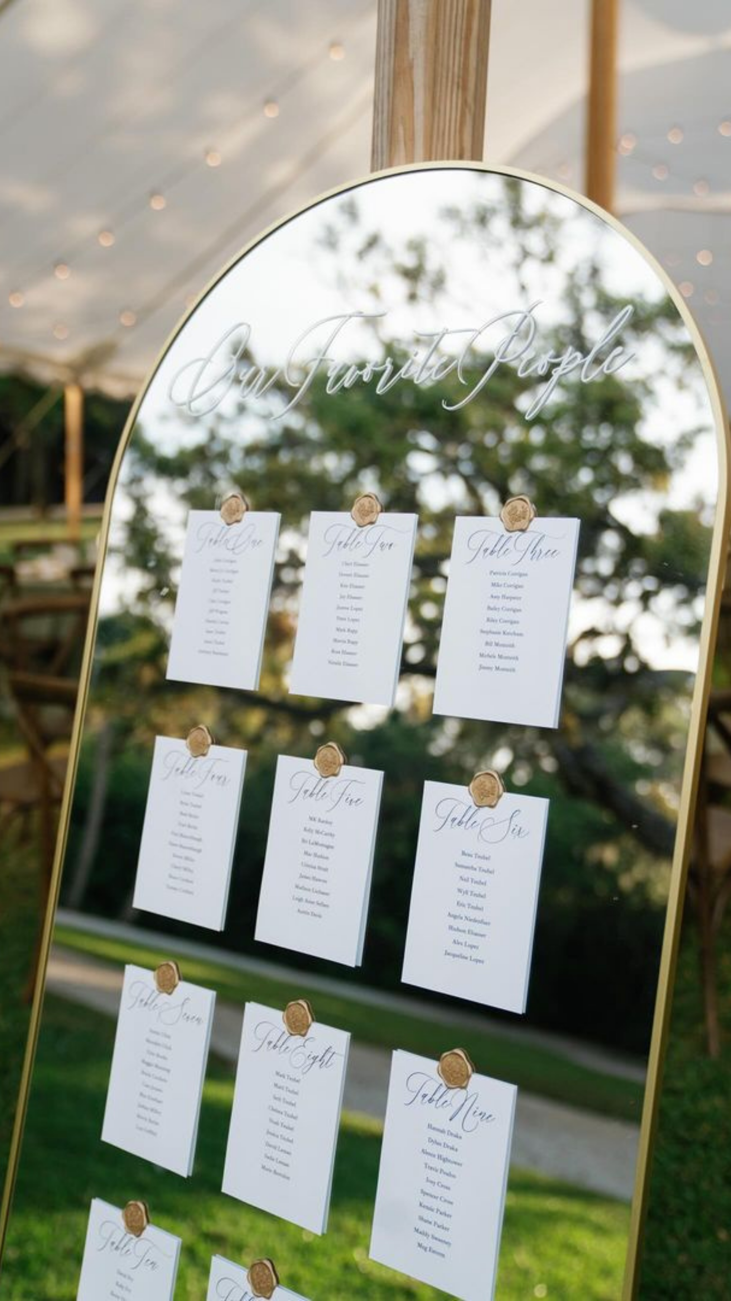 Wedding Table Seating Chart on Large Gold Arch Mirror