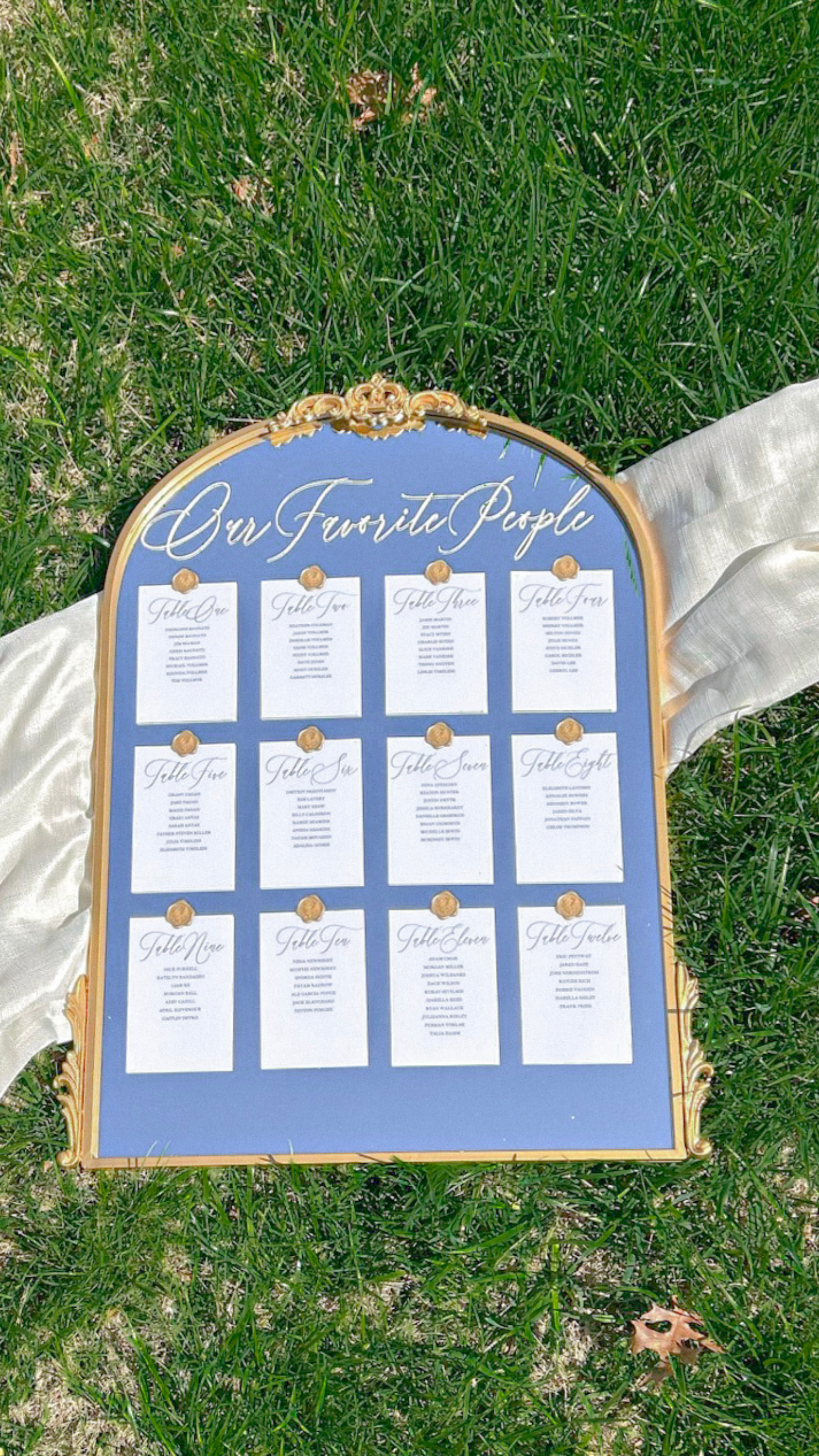 Elegant Wedding Guest Table Layout Seating Chart on Arch Mirror