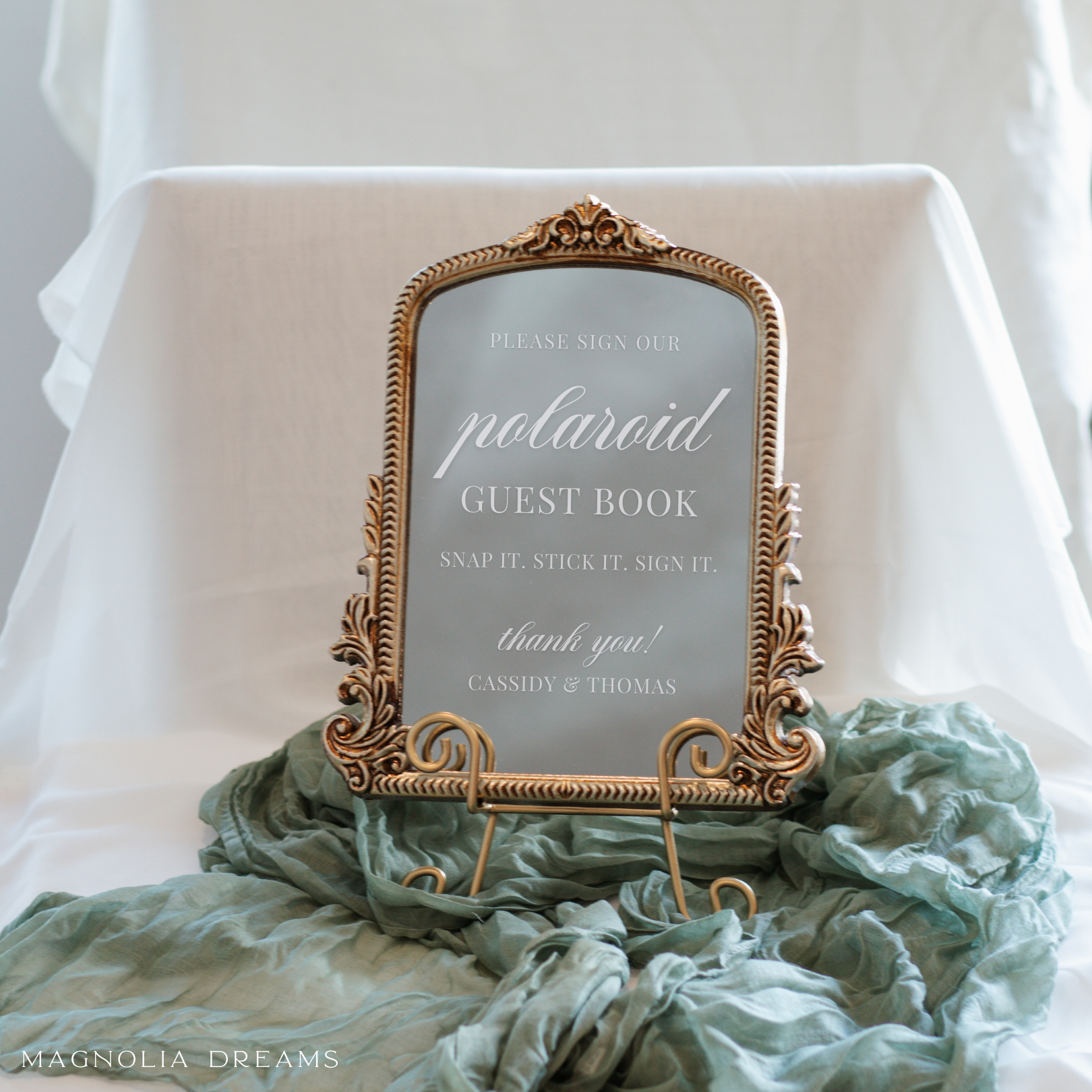 Elegant guest book sign for wedding table with calligraphy on a decorative mirror frame by Magnolia Dreams.